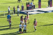 Jogadores do Corinthians atravessam gramado da Fazendinha de joelhos ap�s t�tulo do Paulista Sub-17