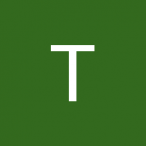 T.